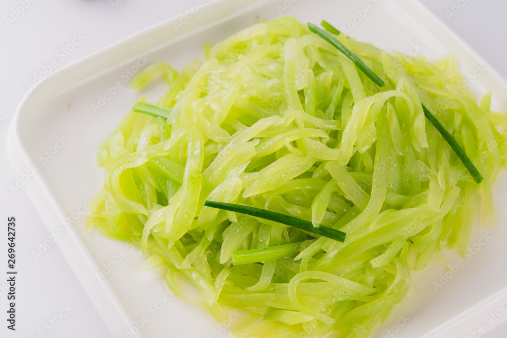 A dish of spicy Hunan cuisine in white background A dish of spicy Hunan cuisine in white background