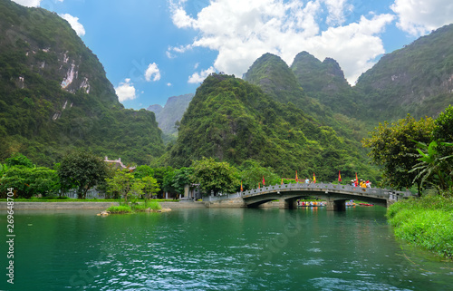 The scenic landscape of limestone mountains at Tam Coc National Park. Tam Coc is a popular tourist destination in Ninh Binh, Vietnam.