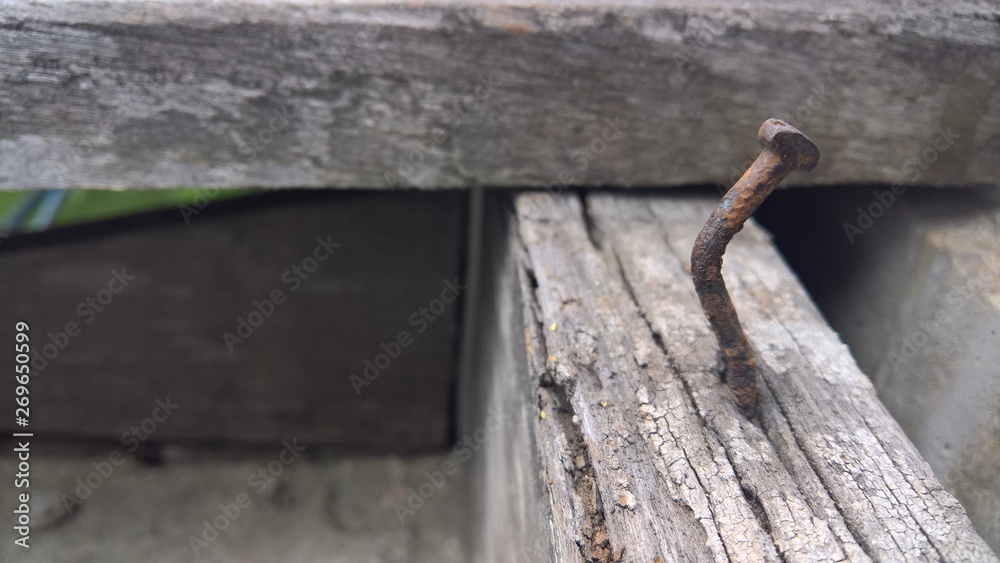 old wooden with nail on old wooden with nail on
