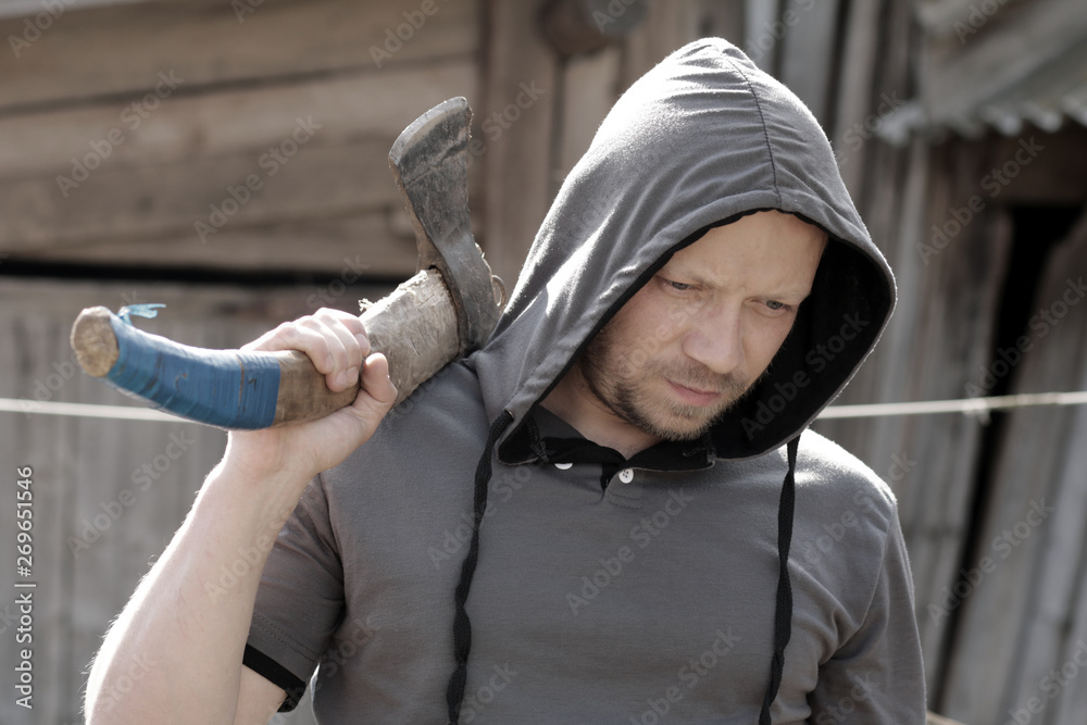 Portrait of the rural man with the axe. Portrait of the rural man with the axe.