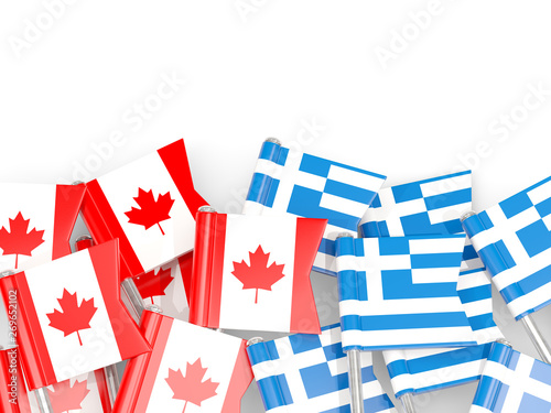 Pins with flags of Canada and greece isolated on white.
