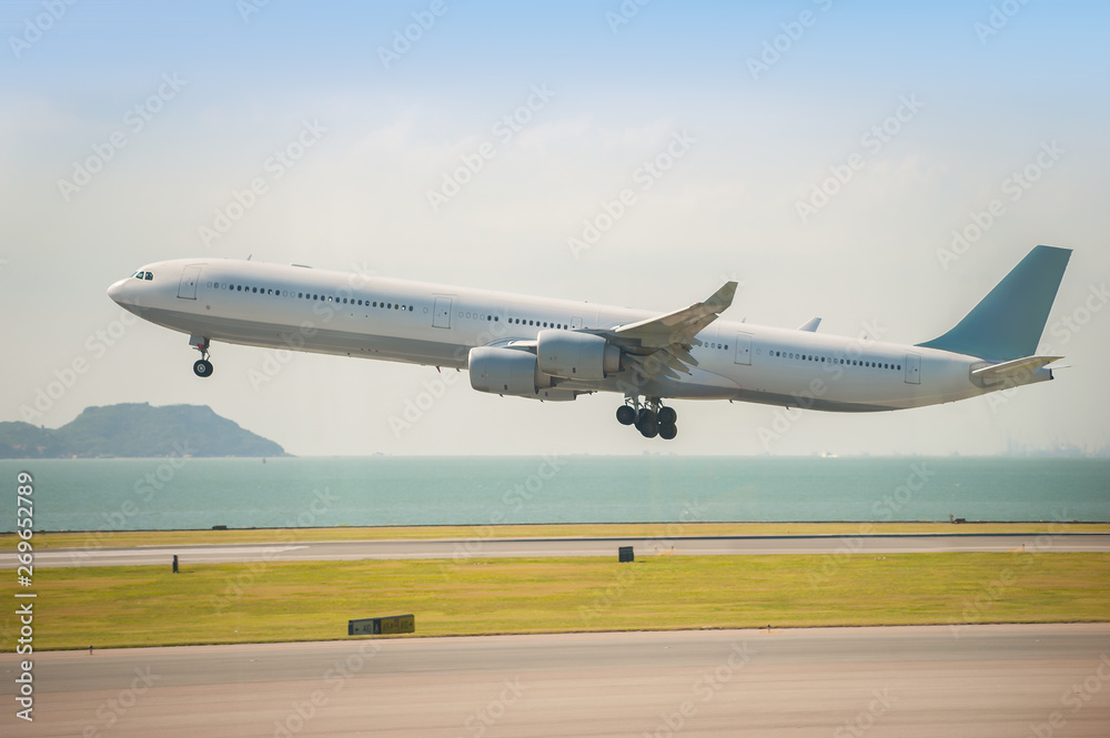 Departure of the aircraft from Hong Kong airport Departure of the aircraft from Hong Kong airport