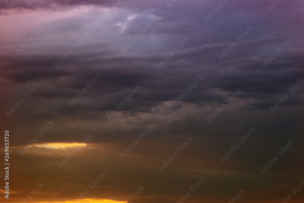 lovely vivid sun colored clouds in the sky for using in design as background.