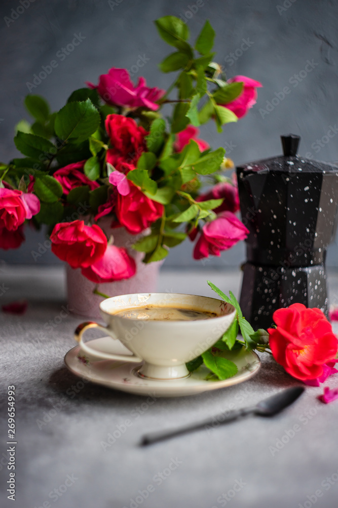 Coffee time with red roses Coffee time with red roses