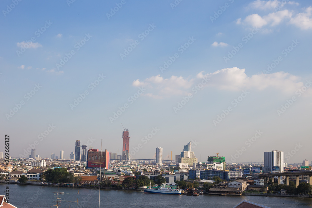 Modern city downtown building of Bangkok skyling with river