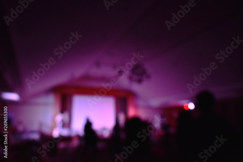 blur of stage on mini cocert in meeting hall photo