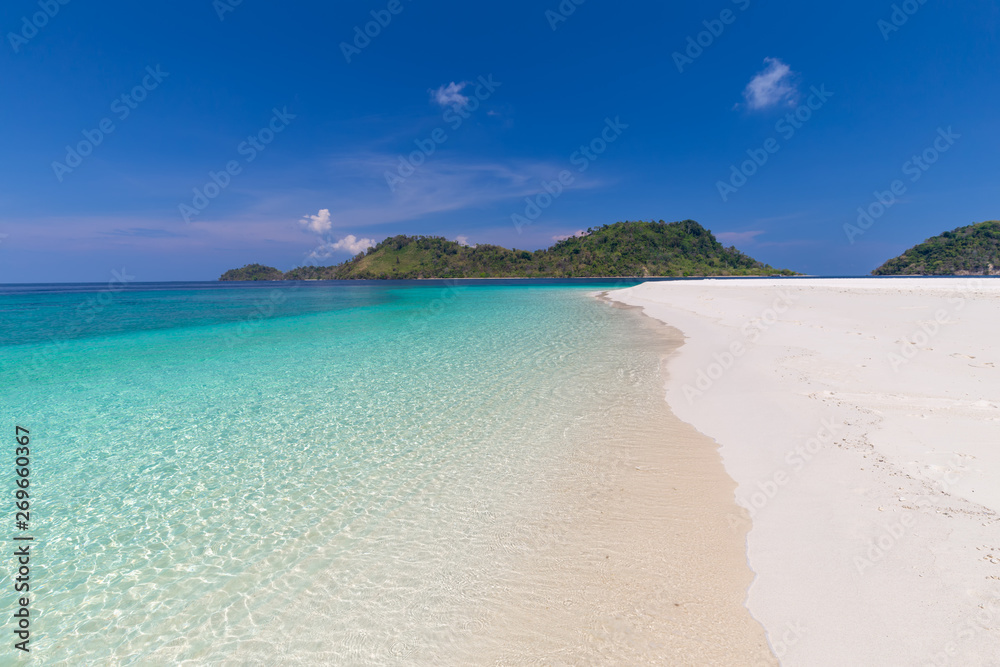 Tropical beach paradise and the blue sky at Khai Island in Satun Province , Thailand