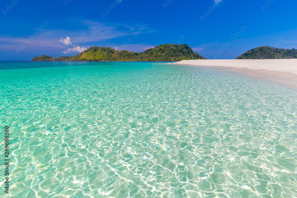 Tropical beach paradise and the blue sky at Khai Island in Satun Province , Thailand