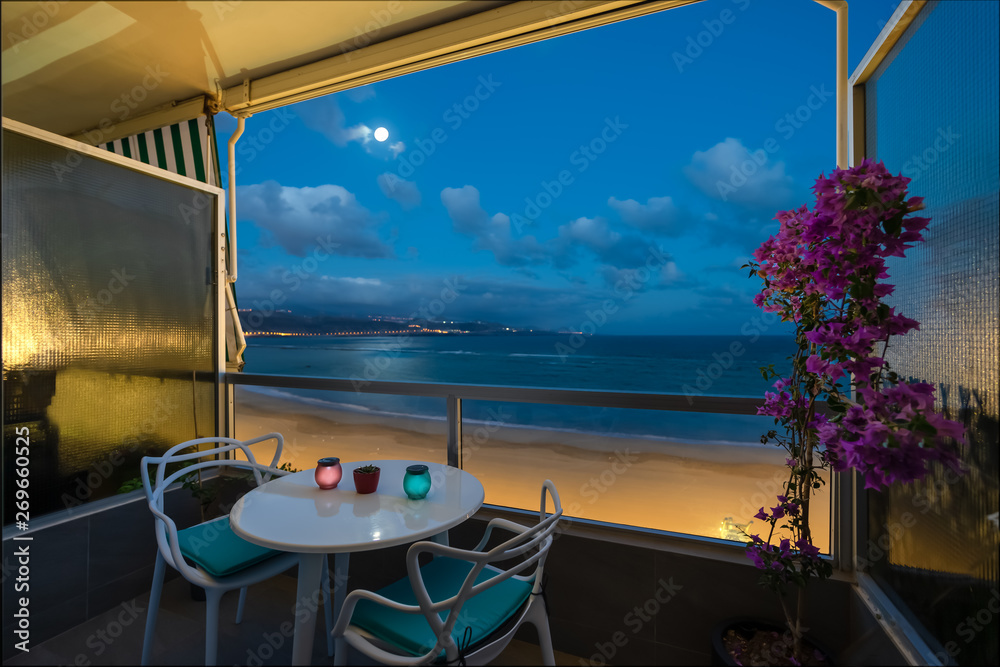 Fototapeta premium Under the moonlight on the beach