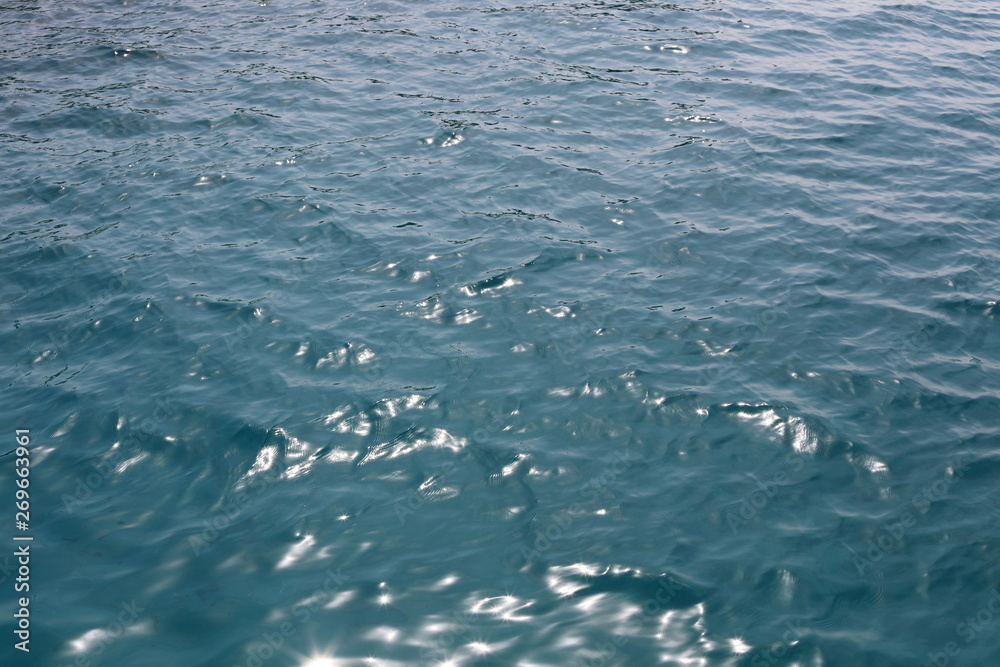Naklejka premium blue water ripple background