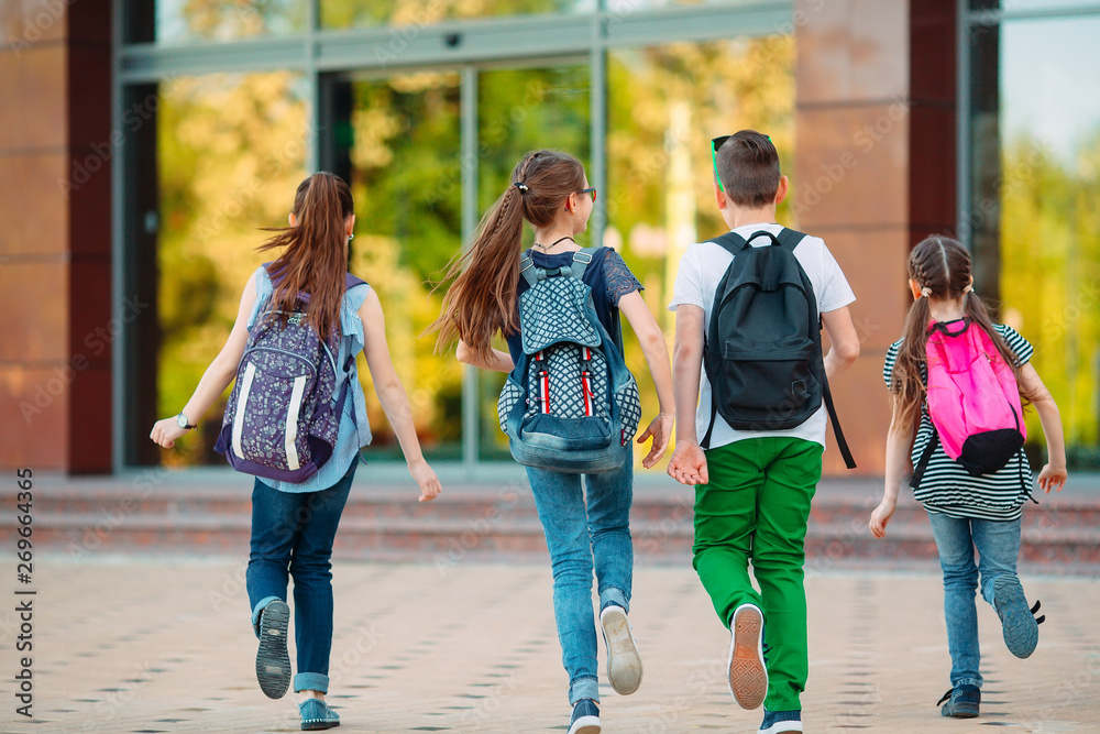 Group of kids going to school together. Group of kids going to school together.