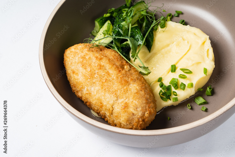 cutlet with mashed potato and salad