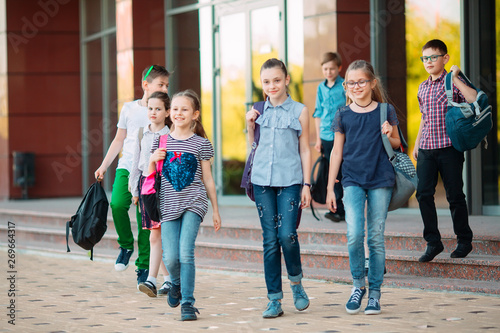 Group of kids going to school together.