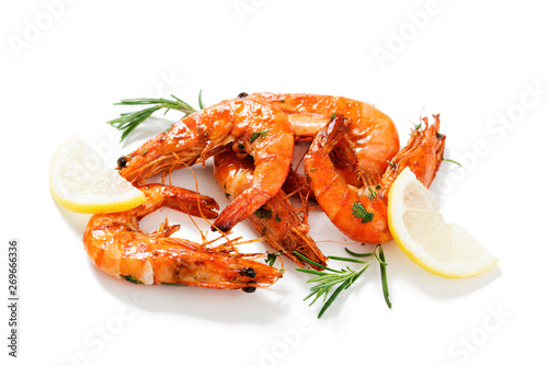 Grilled tiger shrimp with  lemon . isolated on white background