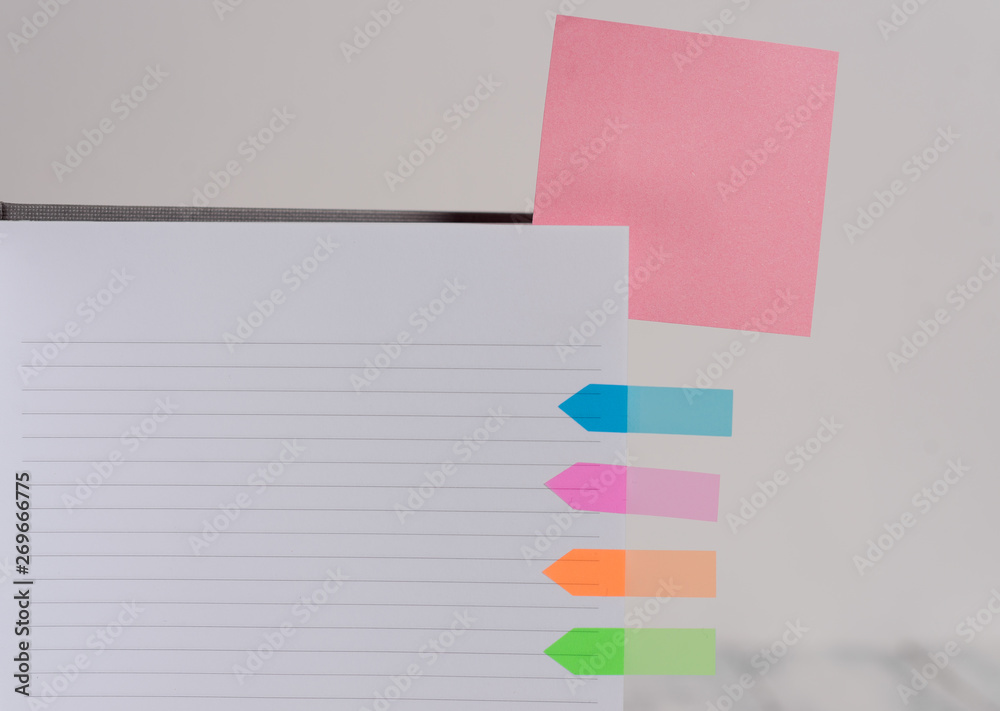 Hard cover note book sticky note arrow banners inserted clear background