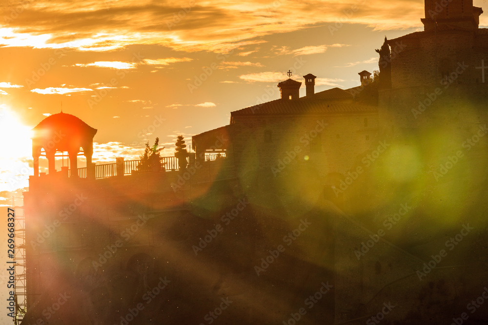 Fototapeta premium Sunset over Varlaam monastery in Meteora, Greece