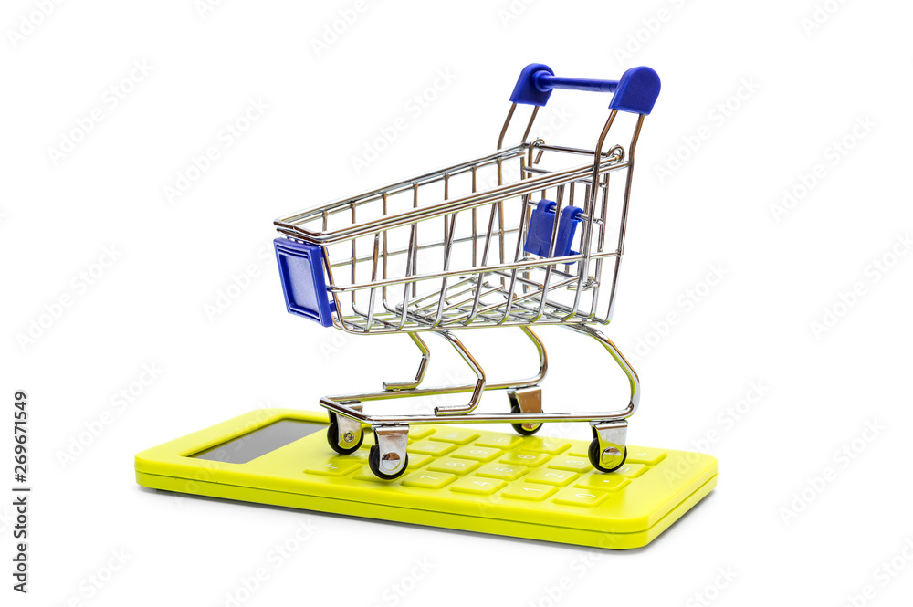 Shopping cart with calculator on white background. Shopping cart with calculator on white background.