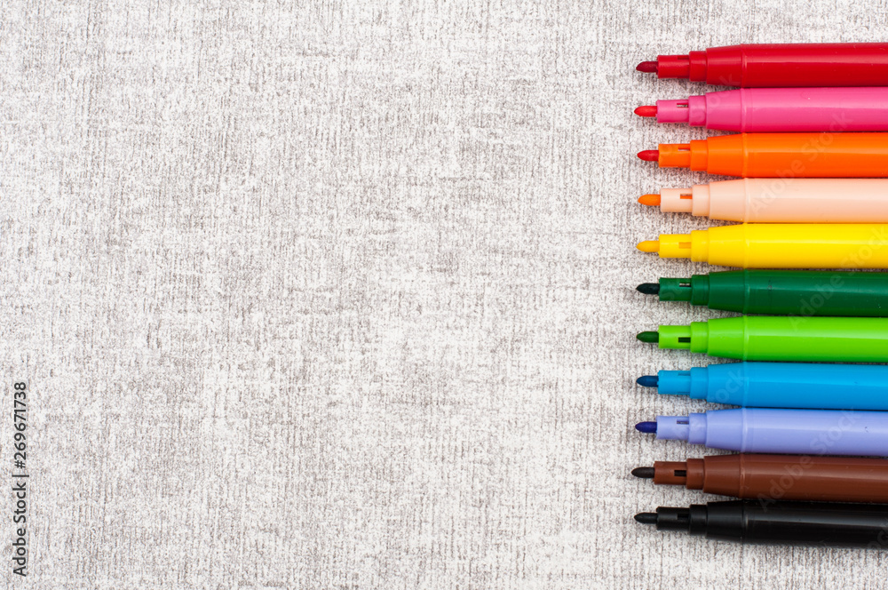 Set of felt-tip pens of different colors with blank space for your design or montage. Concept design and creativity. Set of felt-tip pens of different colors with blank space for your design or montage. Concept design and creativity.