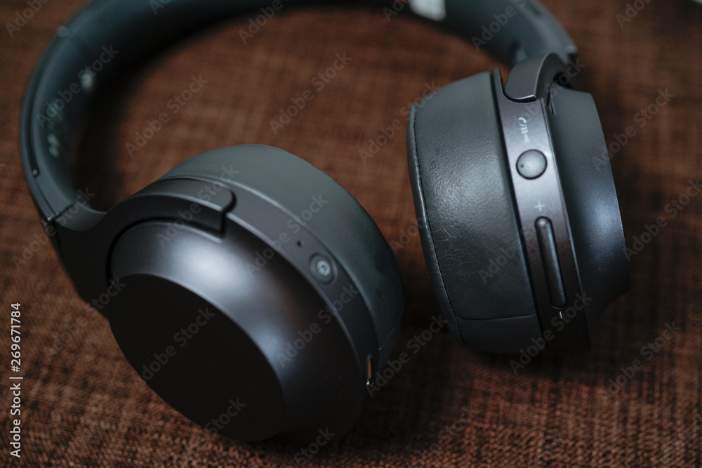 A close up view of black matte High fidelity wireless headphone A close up view of black matte High fidelity wireless headphone