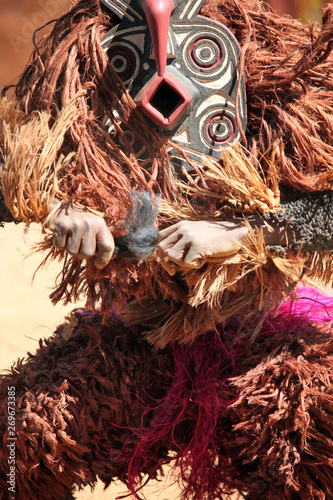 Ceremonial mask dancer in Burkina Faso, Africa photo