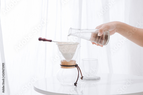 Pouring Water to the Coffee Pot on White Wall and White Table, Manual Brew, Hand Drip Coffee