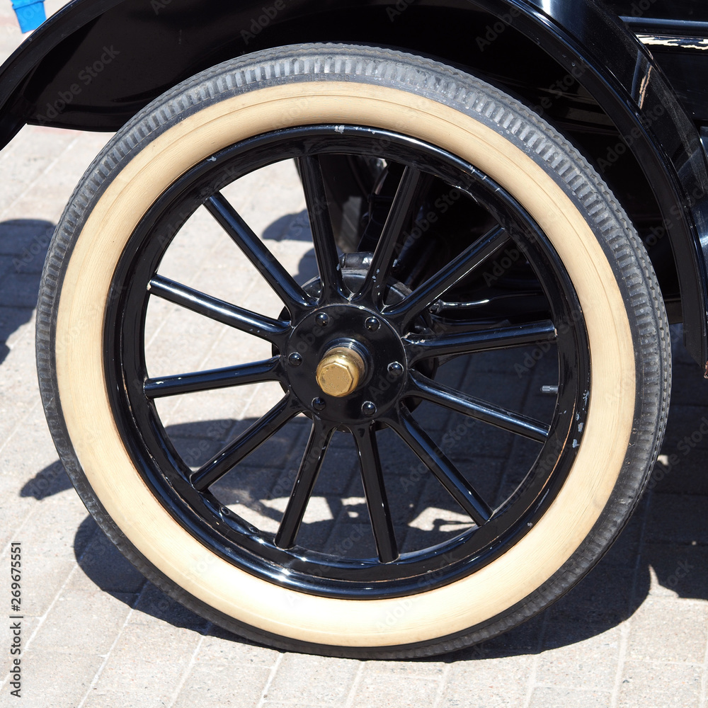 The wheel of an old car of the early twentieth century