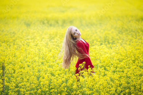 redhead girl in yellow field