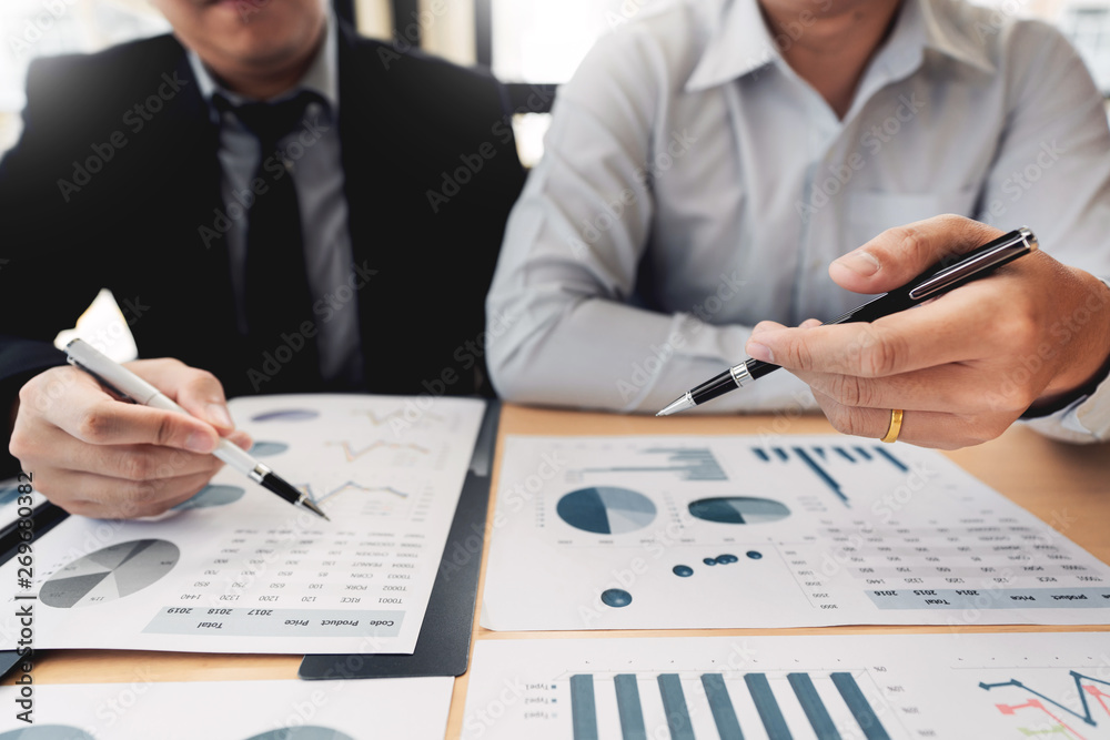 Business Corporate team brainstorming, Planning Strategy having a discussion Analysis investment researching with chart at office his desk documents and saving concept Business Corporate team brainstorming, Planning Strategy having a discussion Analysis investment researching with chart at office his desk documents and saving concept