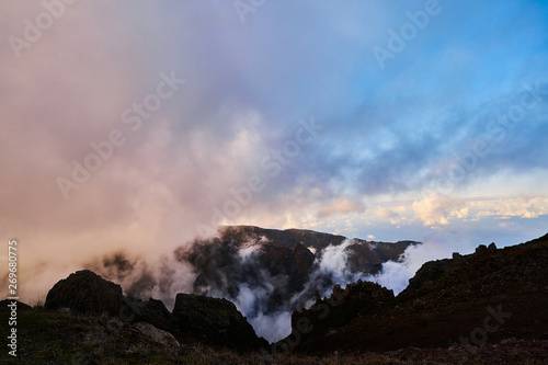 Mountain view from pico de arieiro with mountains, ocean, clouds and blue sky © Andrei