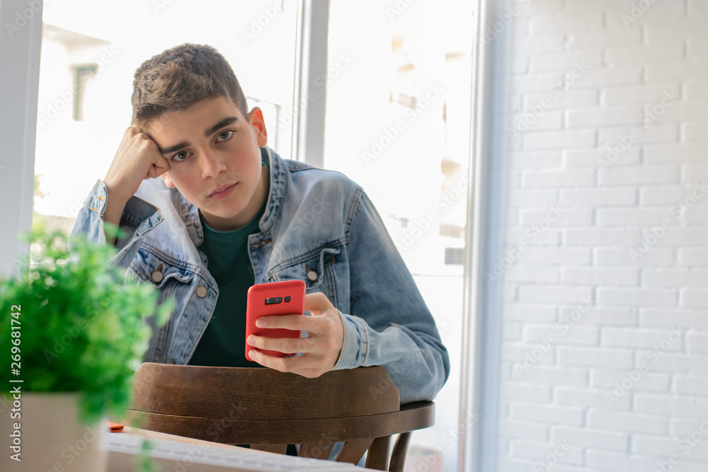 young or teen with mobile phone and computer young or teen with mobile phone and computer