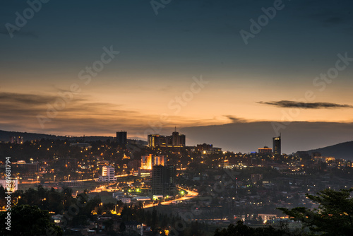 Kigali city centre skyline and surrounding areas lit up at dusk. Rwanda photo