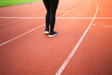 female woman exercise running at sport stadium