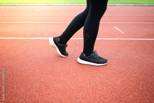 female woman exercise running at sport stadium