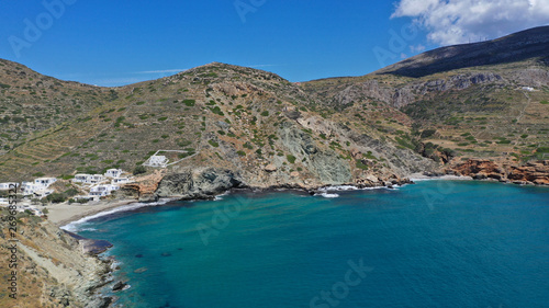 Fototapeta Naklejka Na Ścianę i Meble -  Aerial drone photo of deep turquoise crystal clear sea and rocky sea shore, Folegandros island, Cyclades, Greece