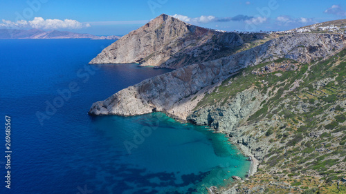 Aerial drone photo of deep turquoise crystal clear sea and rocky sea shore  Folegandros island  Cyclades  Greece