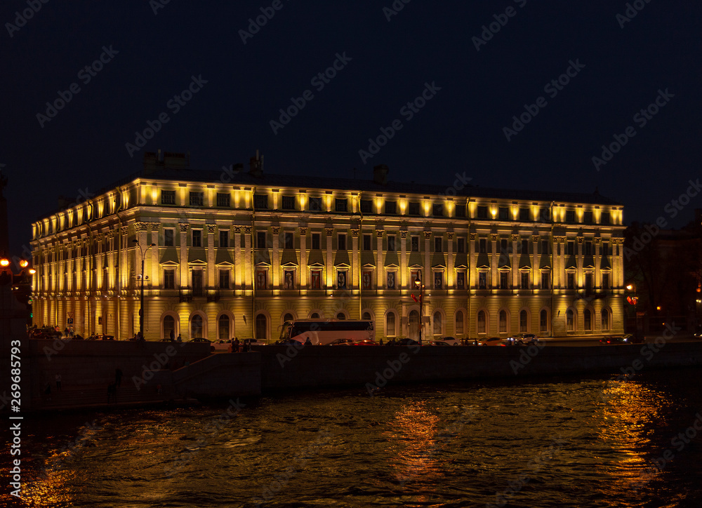 Illuminated buildings on Dvortsovaya Embankment St. Petersburg Russia