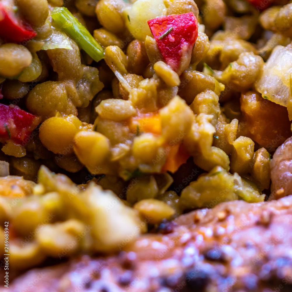 Warm lentil salt with chiles, paprika, green beans and peppers as a side dish with a vegan meatball, food Warm lentil salt with chiles, paprika, green beans and peppers as a side dish with a vegan meatball, food