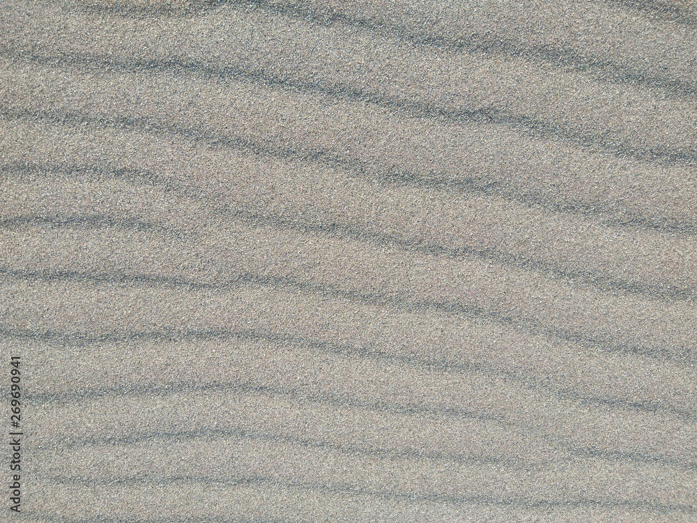 Grey beach sand texture background Grey beach sand texture background