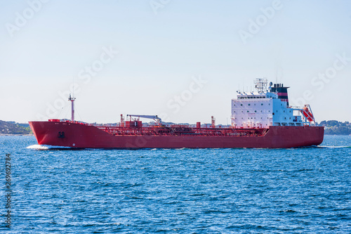 Red Tanker ship sailing on the sea