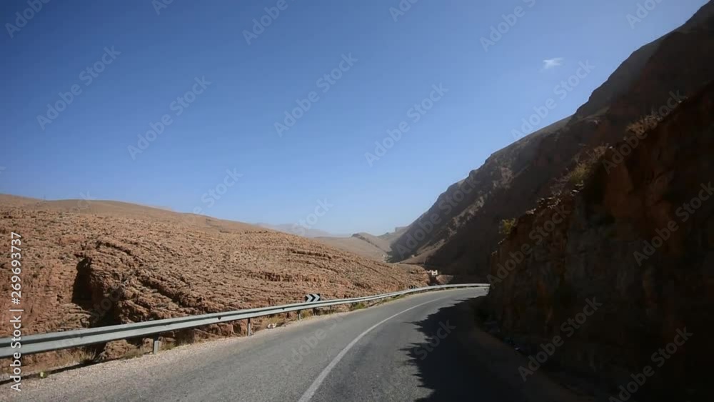 Driving on Dades Gorge Valley Serpentine Road, Atlas Mountains, Morocco, accelerated speed Driving on Dades Gorge Valley Serpentine Road, Atlas Mountains, Morocco, accelerated speed