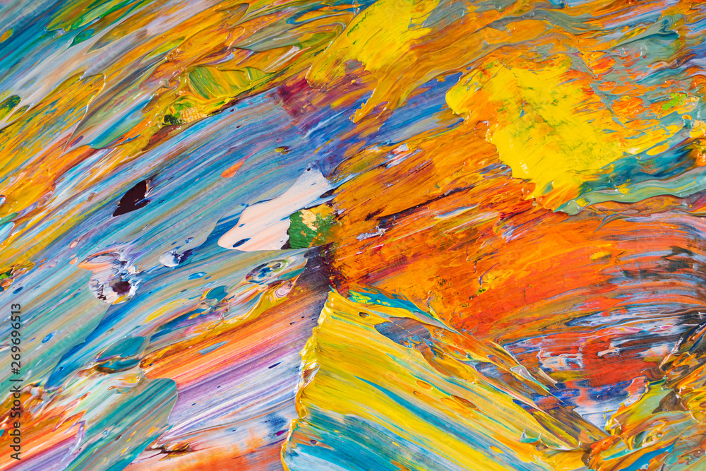 Bright, juicy, multi-colored abstraction of their mixing of oil paints on a palette close-up.
