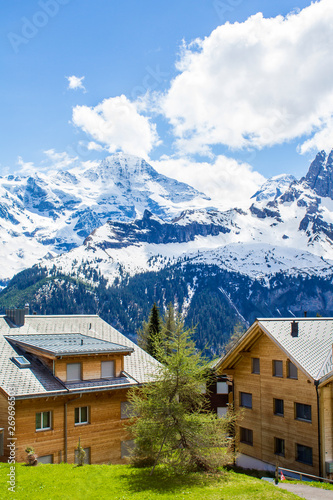 Alpine village. Village Murren in the Swiss Alps. Swiss village in the mountains © ppvector