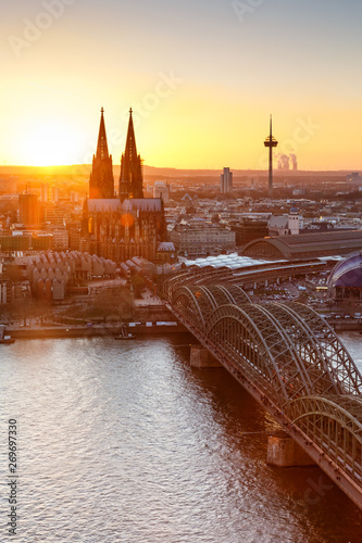 Cologne Cathedral church Germany skyline portrait format city town sunset bridge