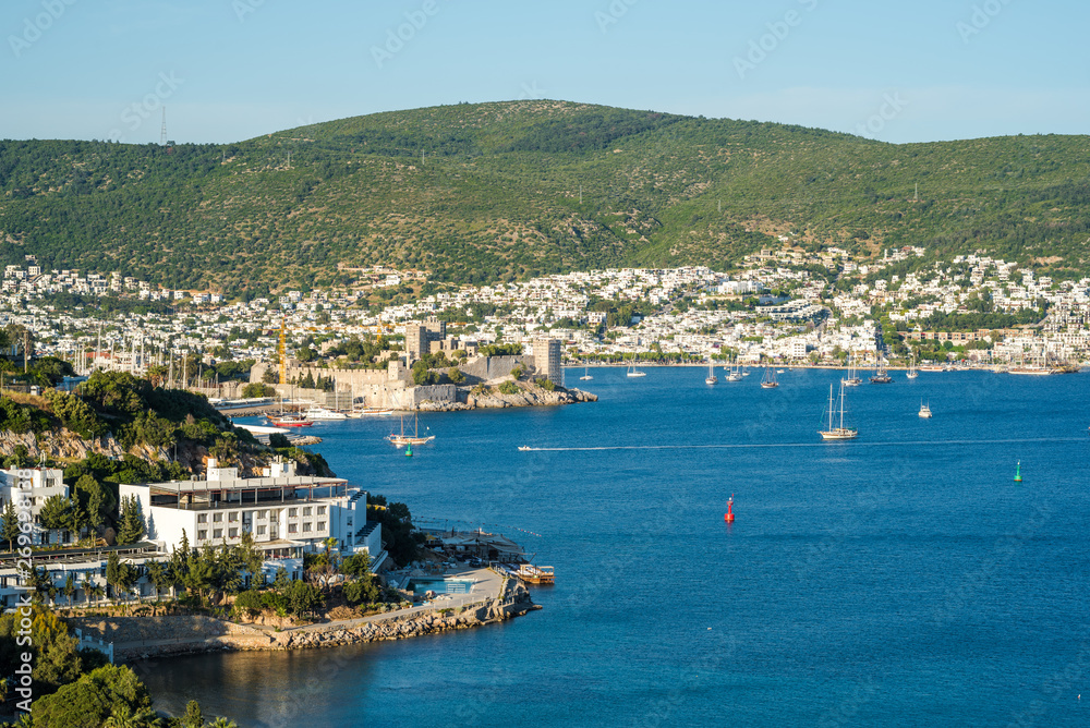Bodrum, Turkey - panorama of Bodrum city. White houses, harbour and hills in the background