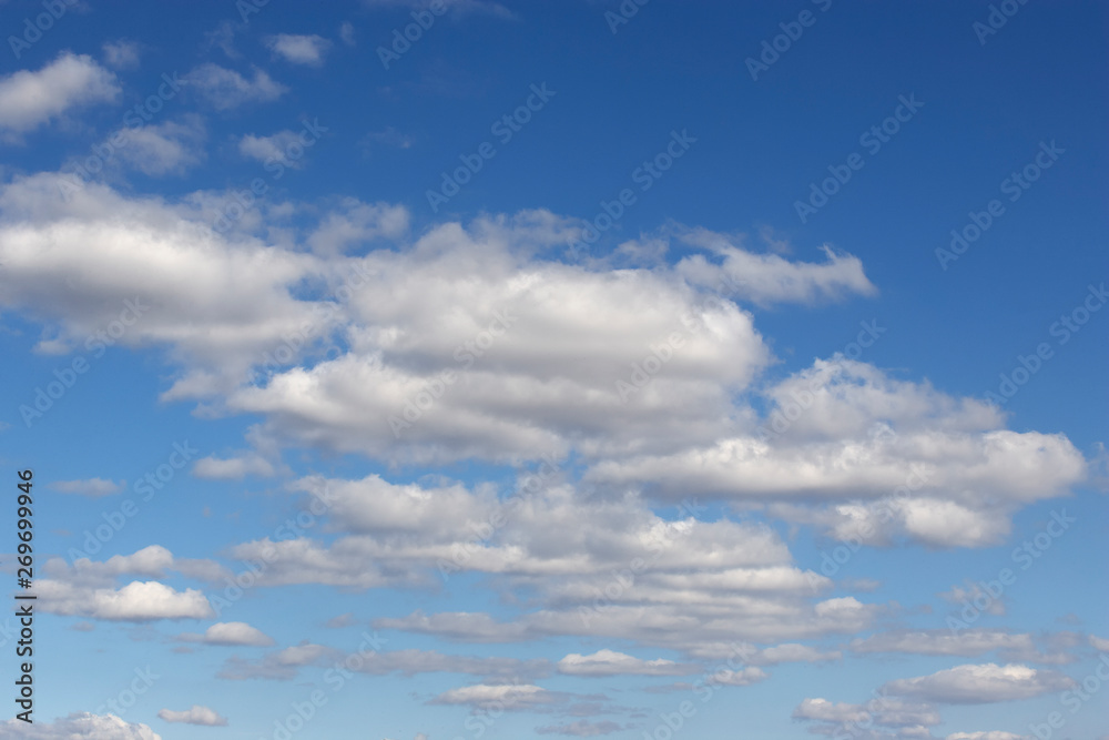 White sparse clouds over blue sky White sparse clouds over blue sky