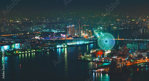 Aerial view of the Osaka Bay harbor area with the ferris wheel at night