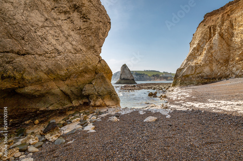 Looking out over a rocky beach at low tide, at Freshwater Bay on the Isle of Wight