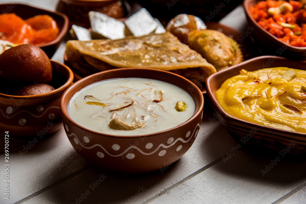group of Indian Sweet / mithai in terracotta bowl group of Indian Sweet / mithai in terracotta bowl