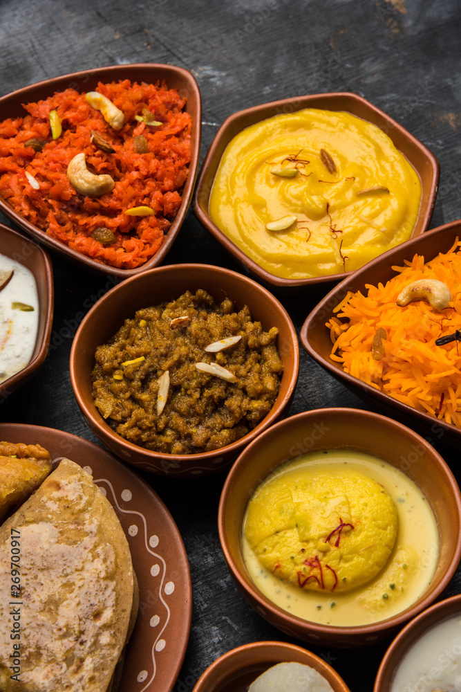 group of Indian Sweet / mithai in terracotta bowl group of Indian Sweet / mithai in terracotta bowl