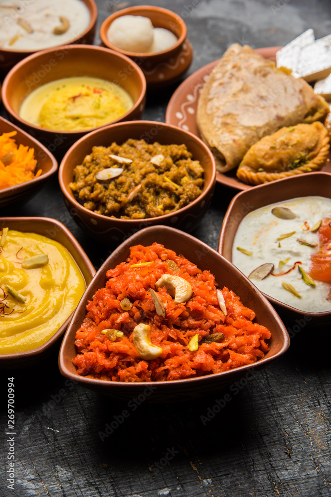 group of Indian Sweet / mithai in terracotta bowl group of Indian Sweet / mithai in terracotta bowl
